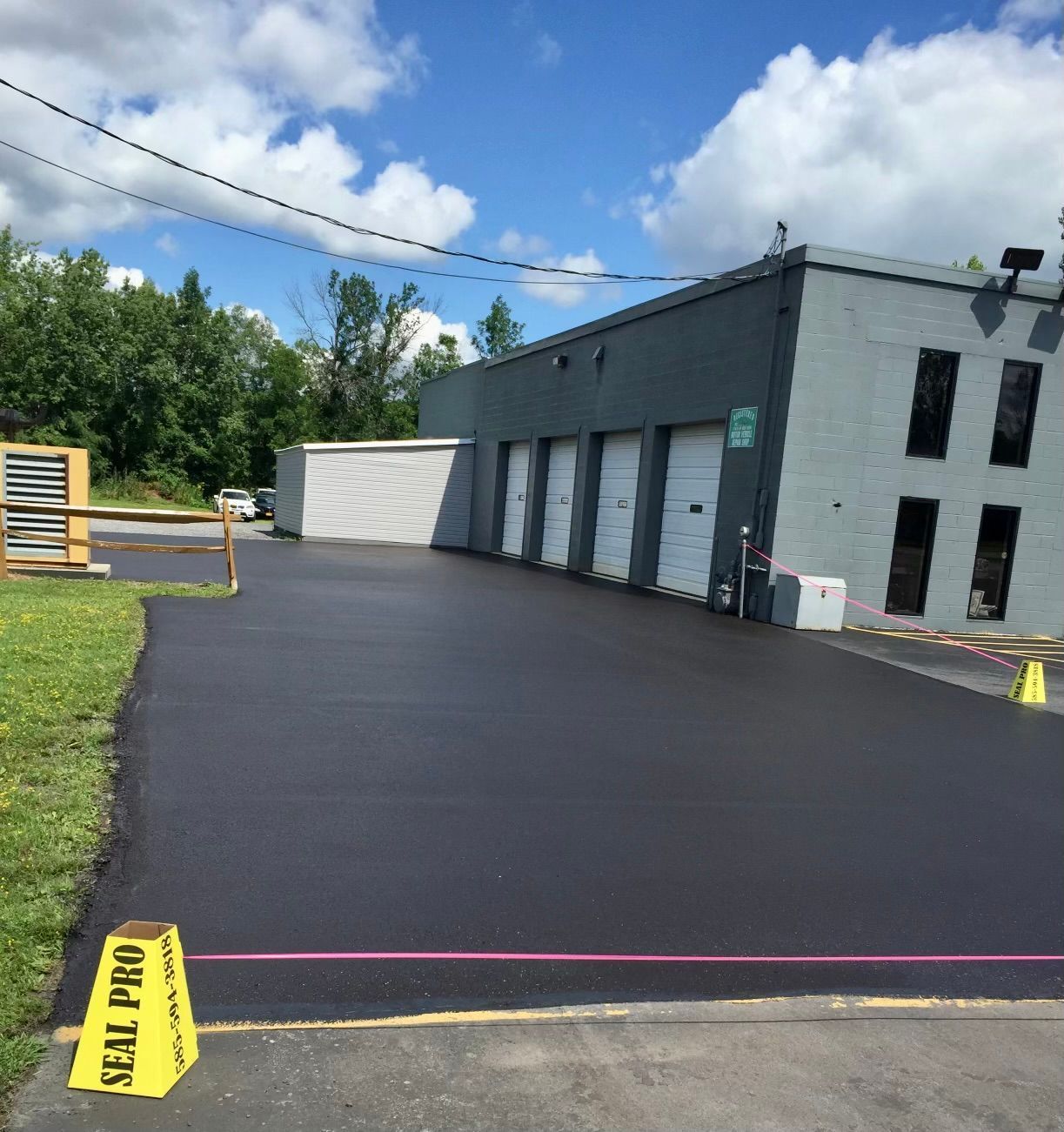 a yellow sign that says seal pro on it