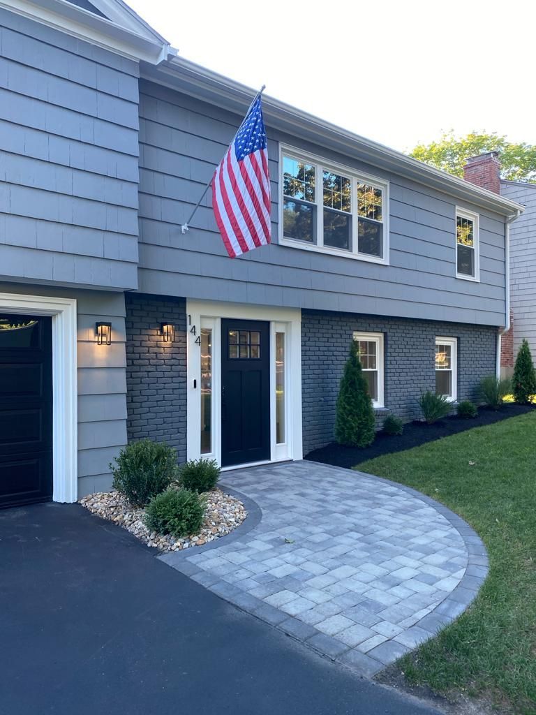 a house with an American flag flying in front of it