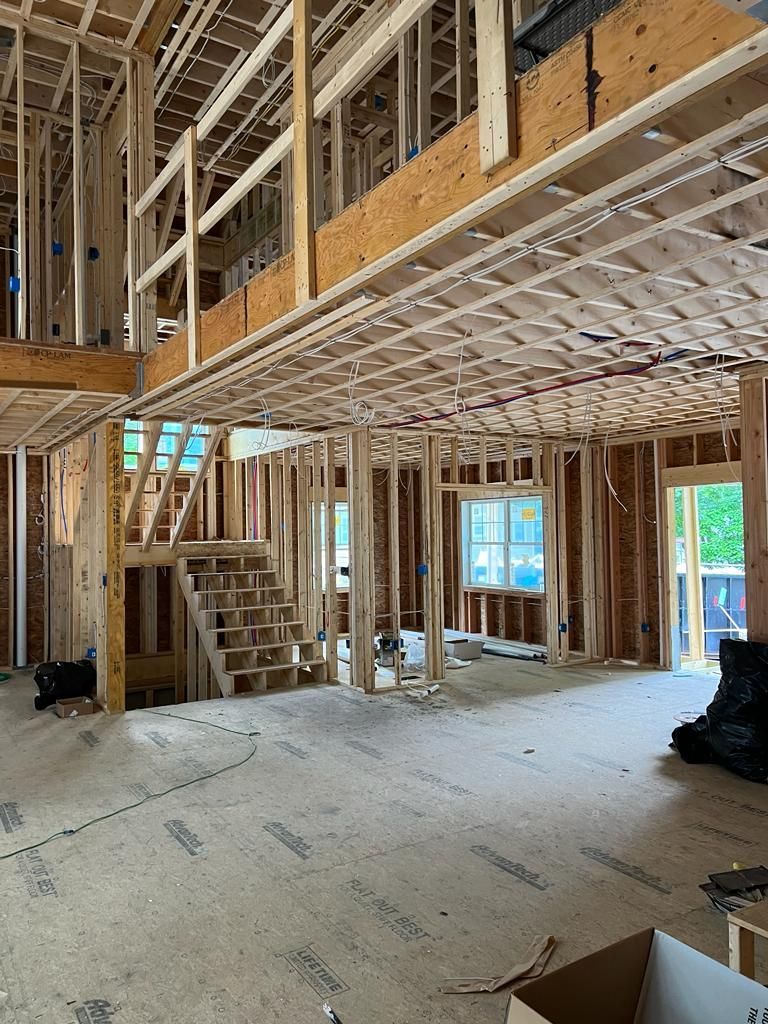 the inside of a house under construction with a staircase