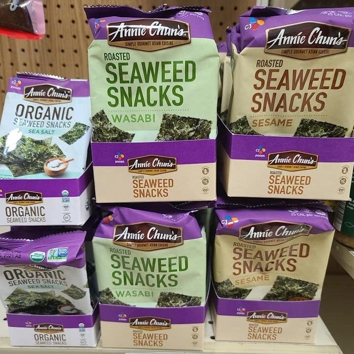 Shelves stocked with Annie Chun's seaweed snacks in various flavors like wasabi and sesame.