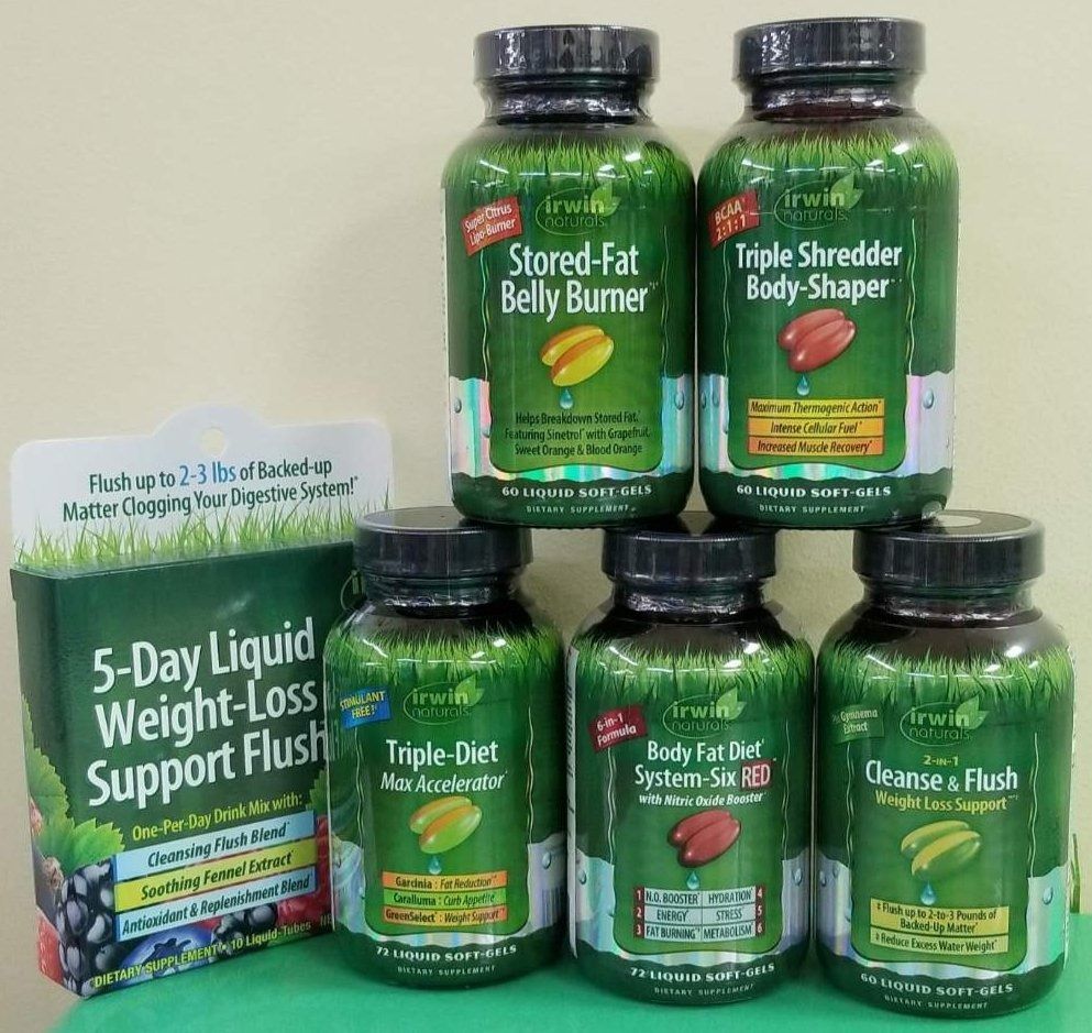 Bottles of Irwin Naturals weight loss supplements stacked, including Belly Bumer and Body-Shaper.