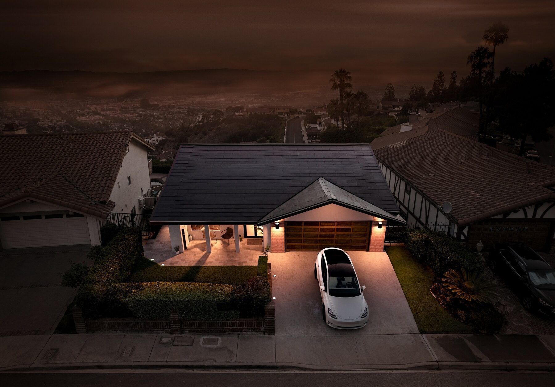A car is parked in front of a house with solar panels on the roof.