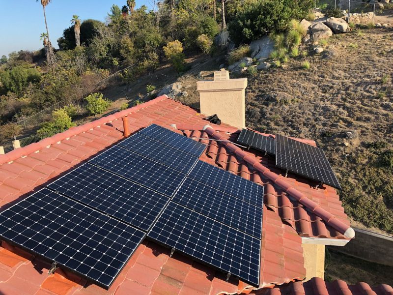 A roof with a lot of solar panels on it