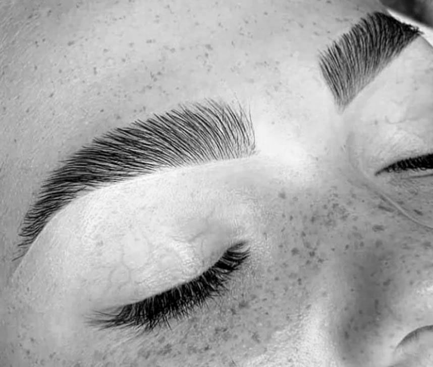 A close up of a woman's beautiful eyebrows