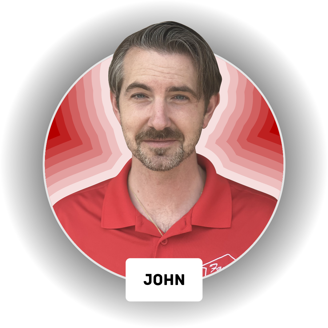 A man in a red shirt with the name john on it