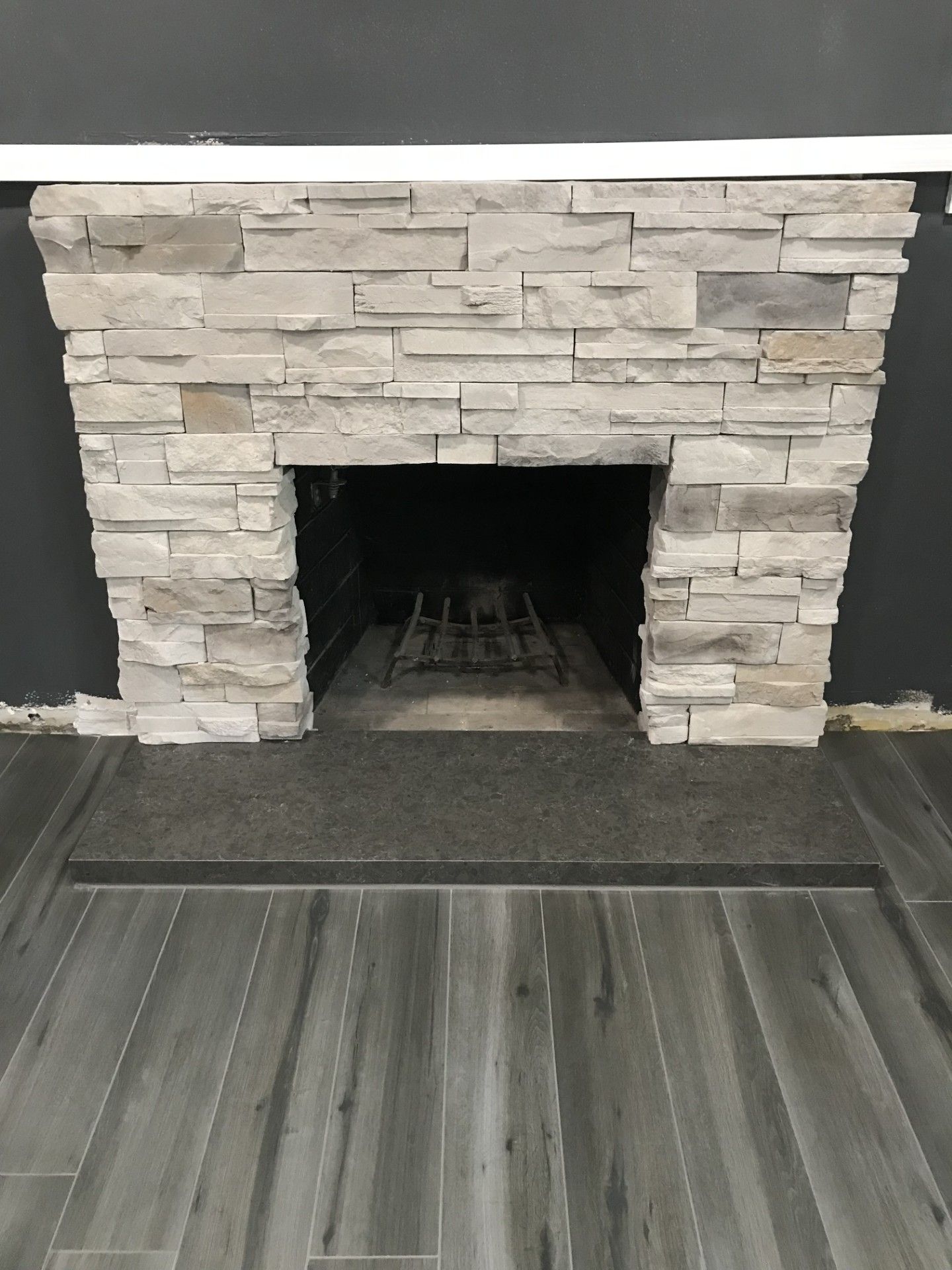 A fireplace in the basement - after