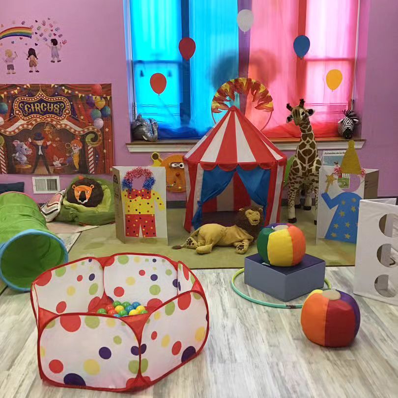 A room with toys and a sign that says circus