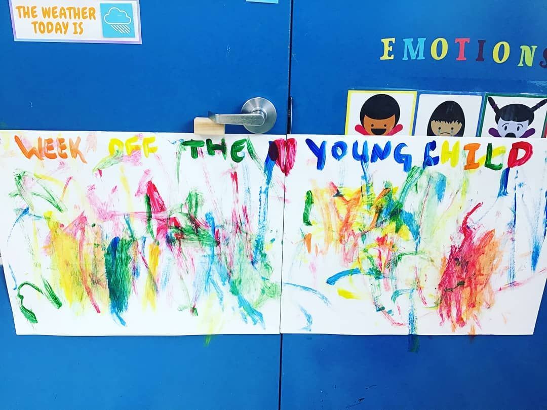 A blue door with a sign