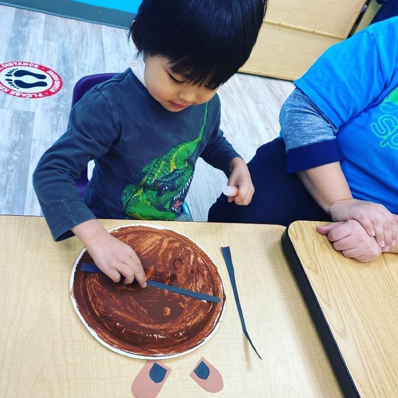 A child doing some artwork