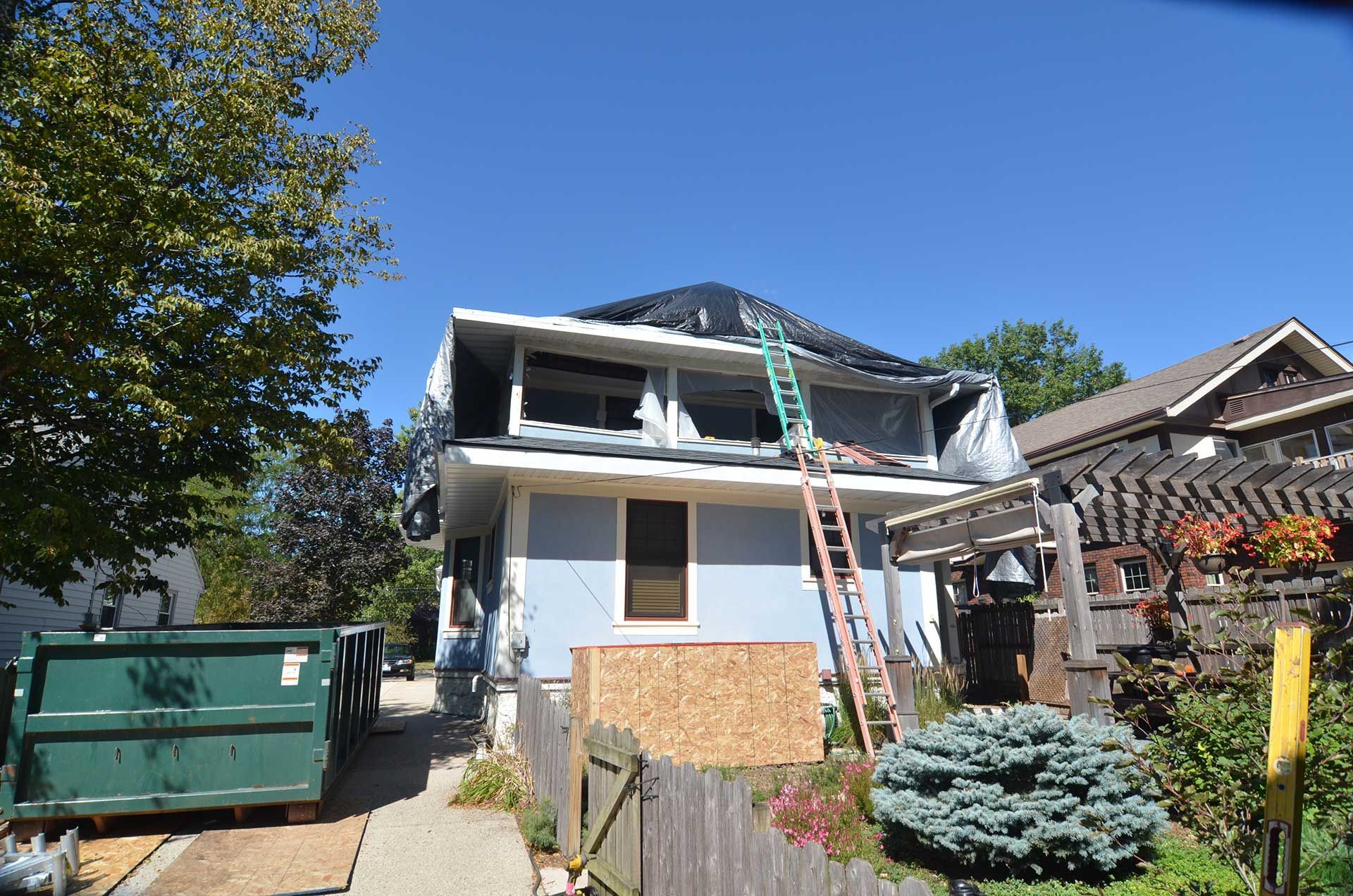 Plastic covering the roof of a house