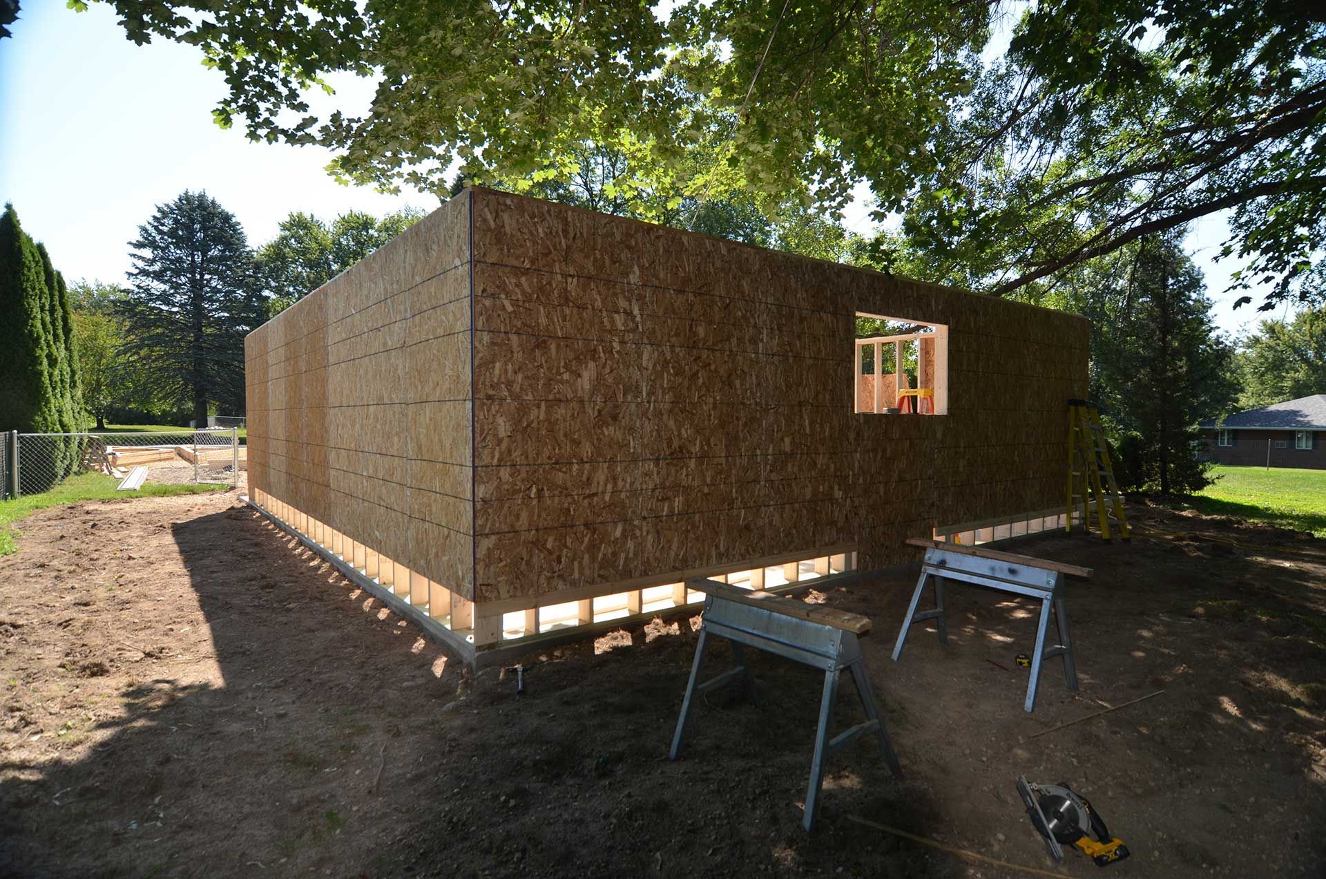 Back view of garage with OSB walls