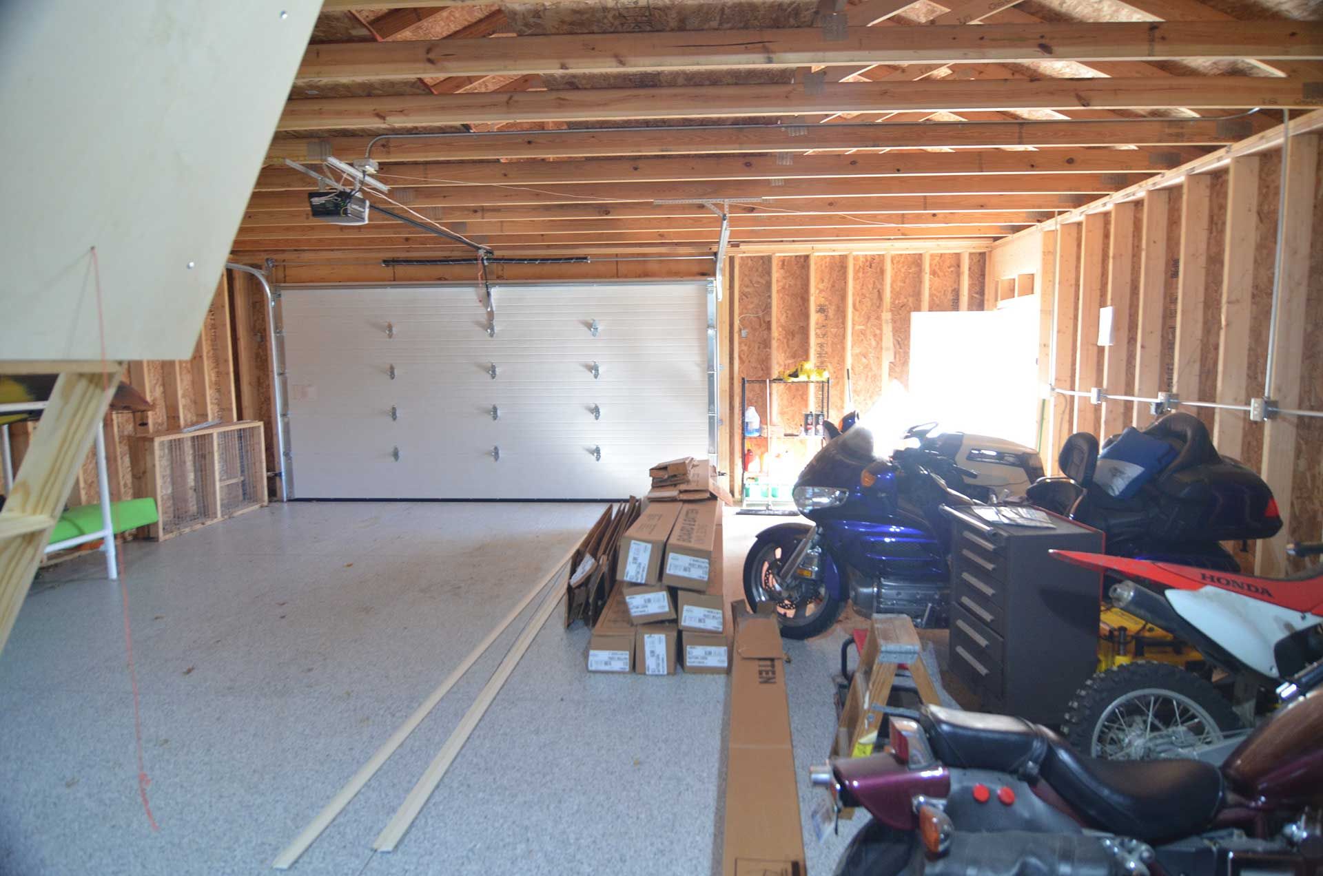 Two motorbikes inside the garage