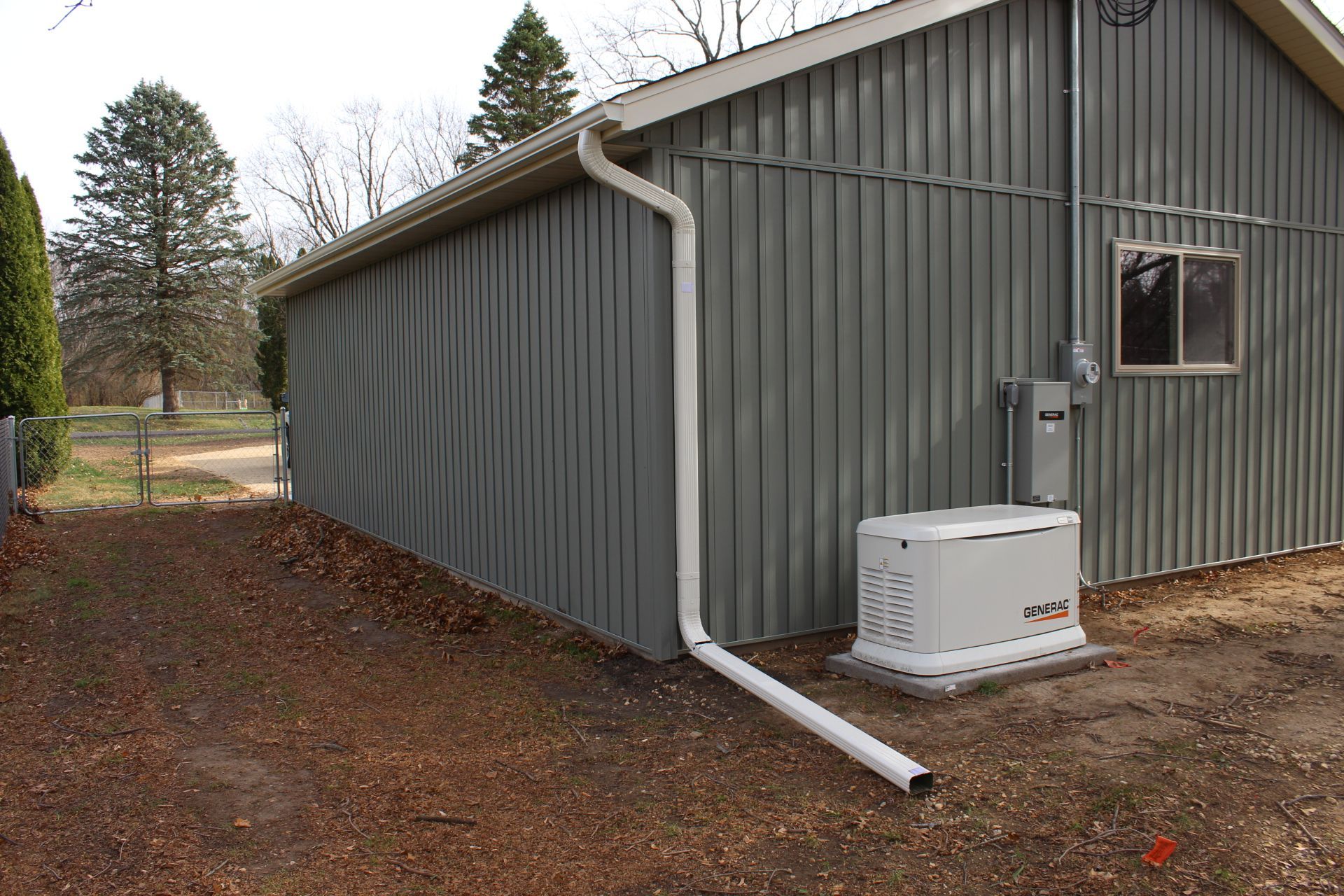 Generator installed behind the garage