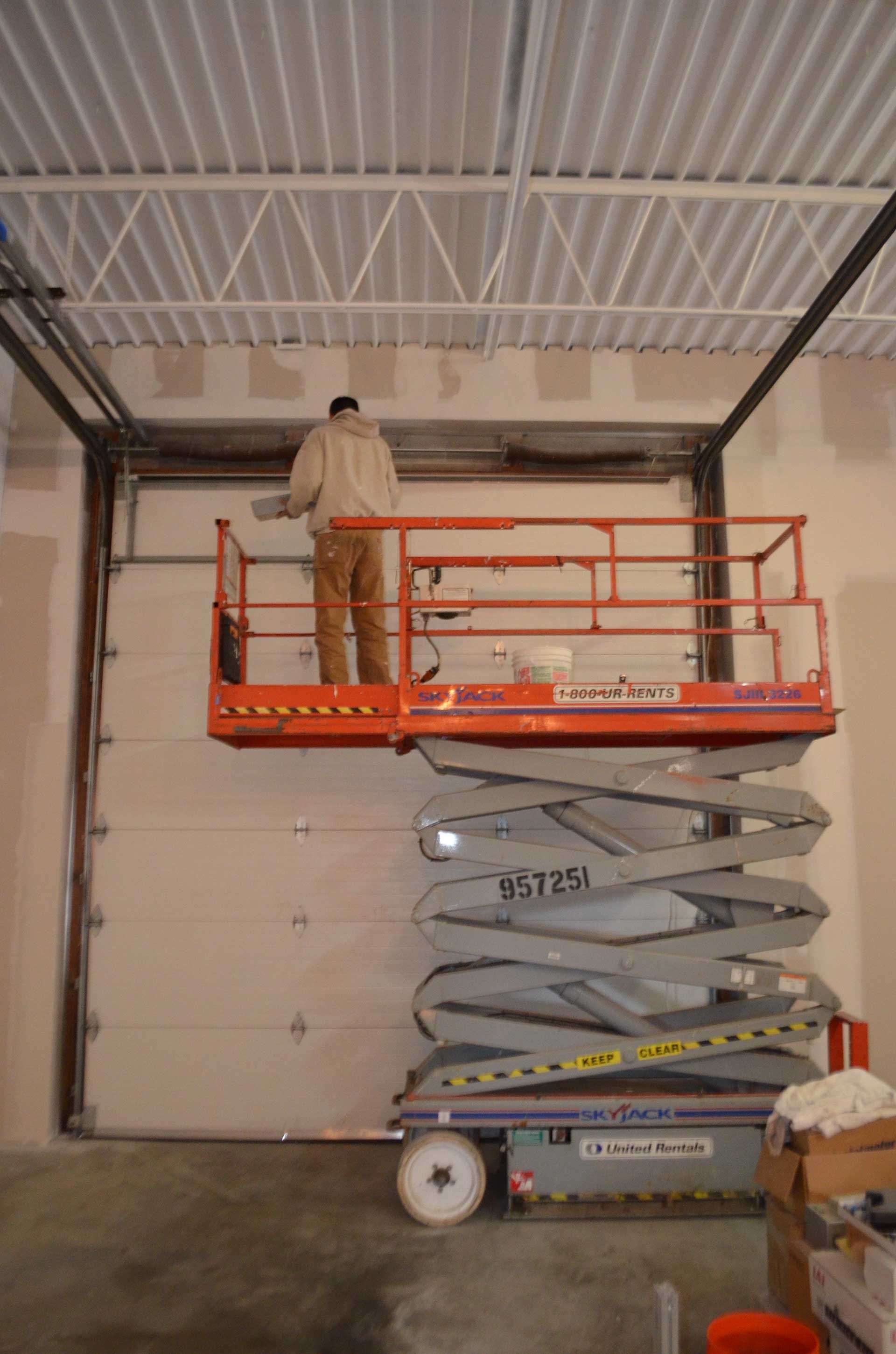 Man on a scissor lift