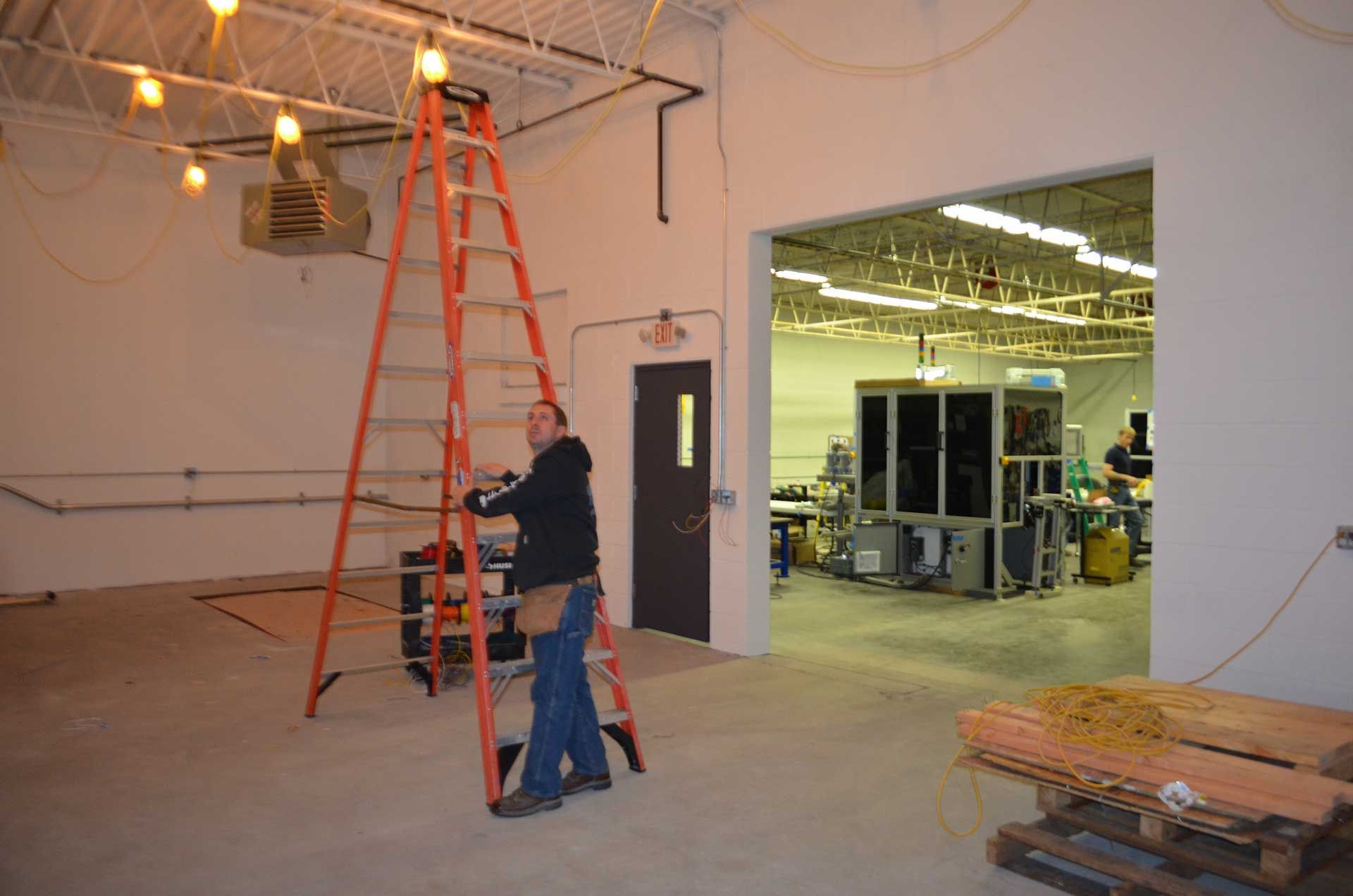 Man holding a ladder