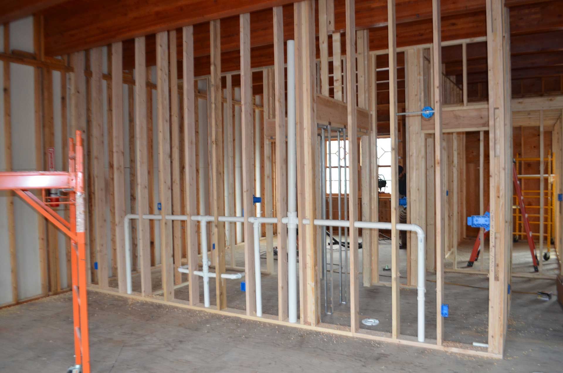 Wall frames with piping