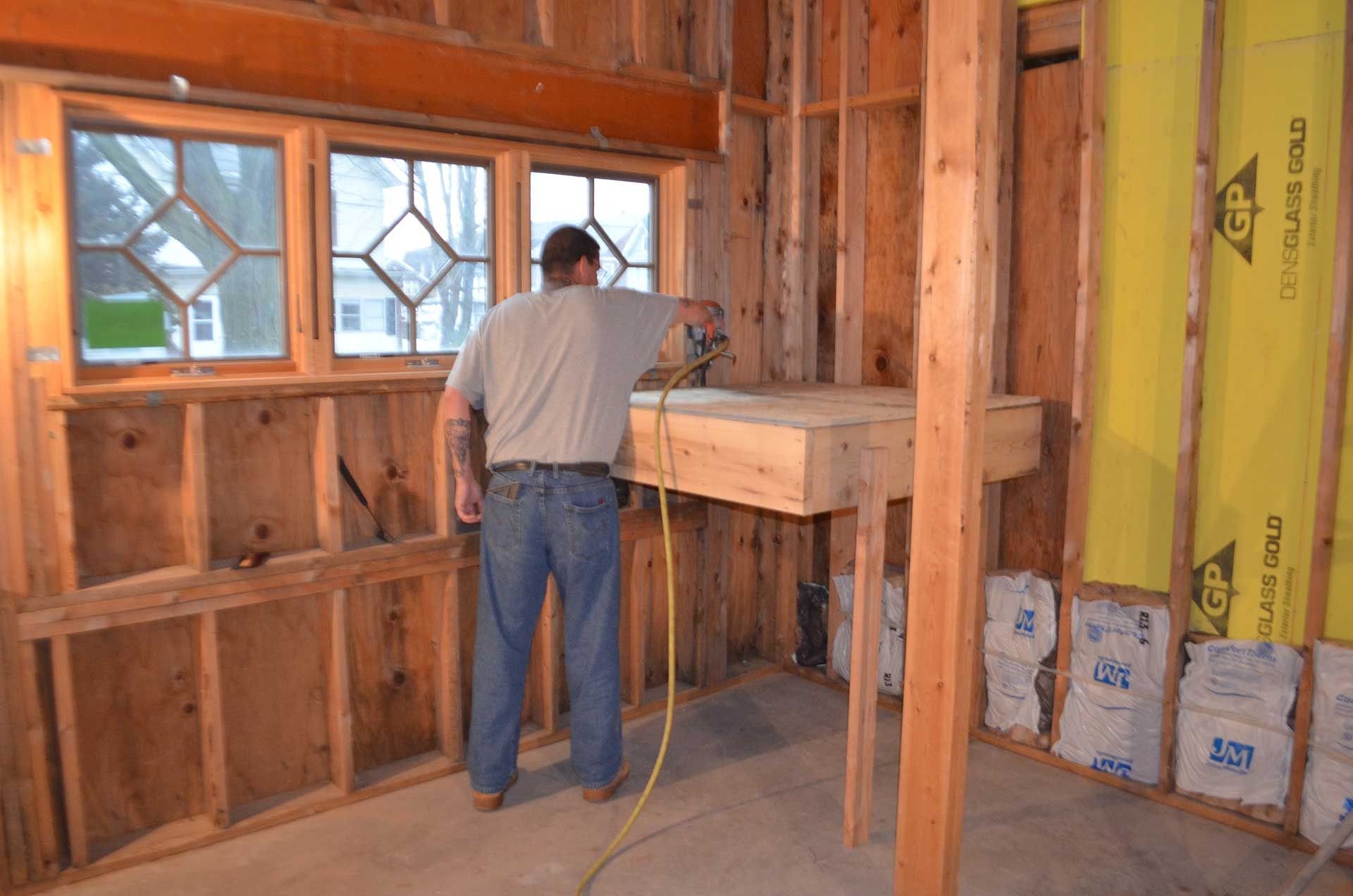 Man working with plywood
