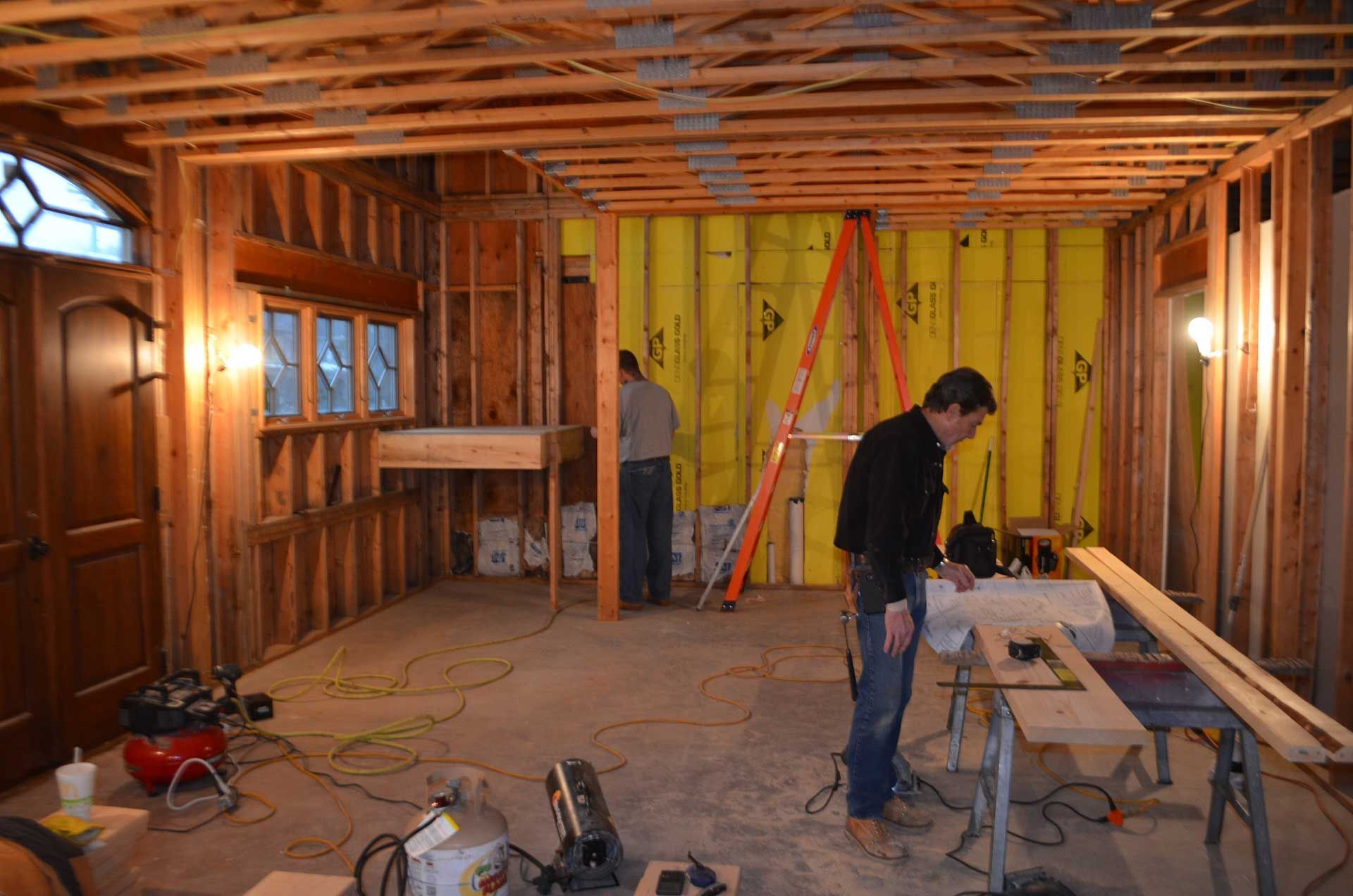 Two men busy working