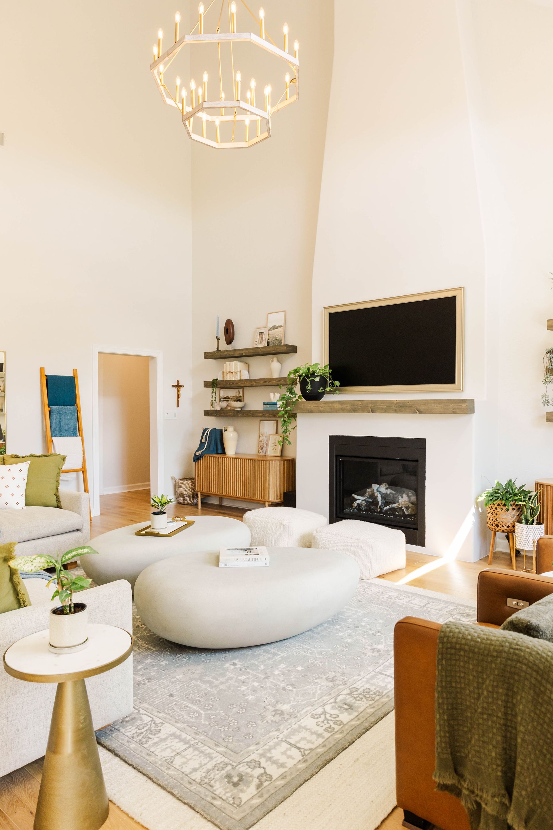 A living room filled with furniture and a fireplace.