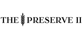 The text THE PRESERVE II in black serif font, separated by a stylized wheat stalk icon between the words.