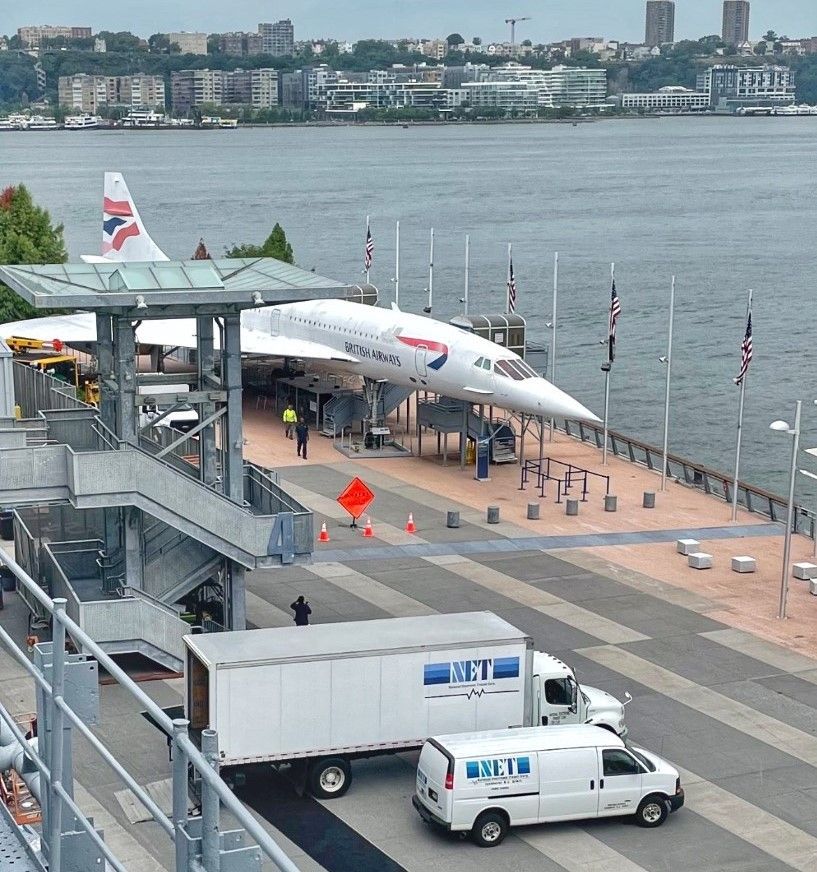 A British Airways plane is parked on a dock