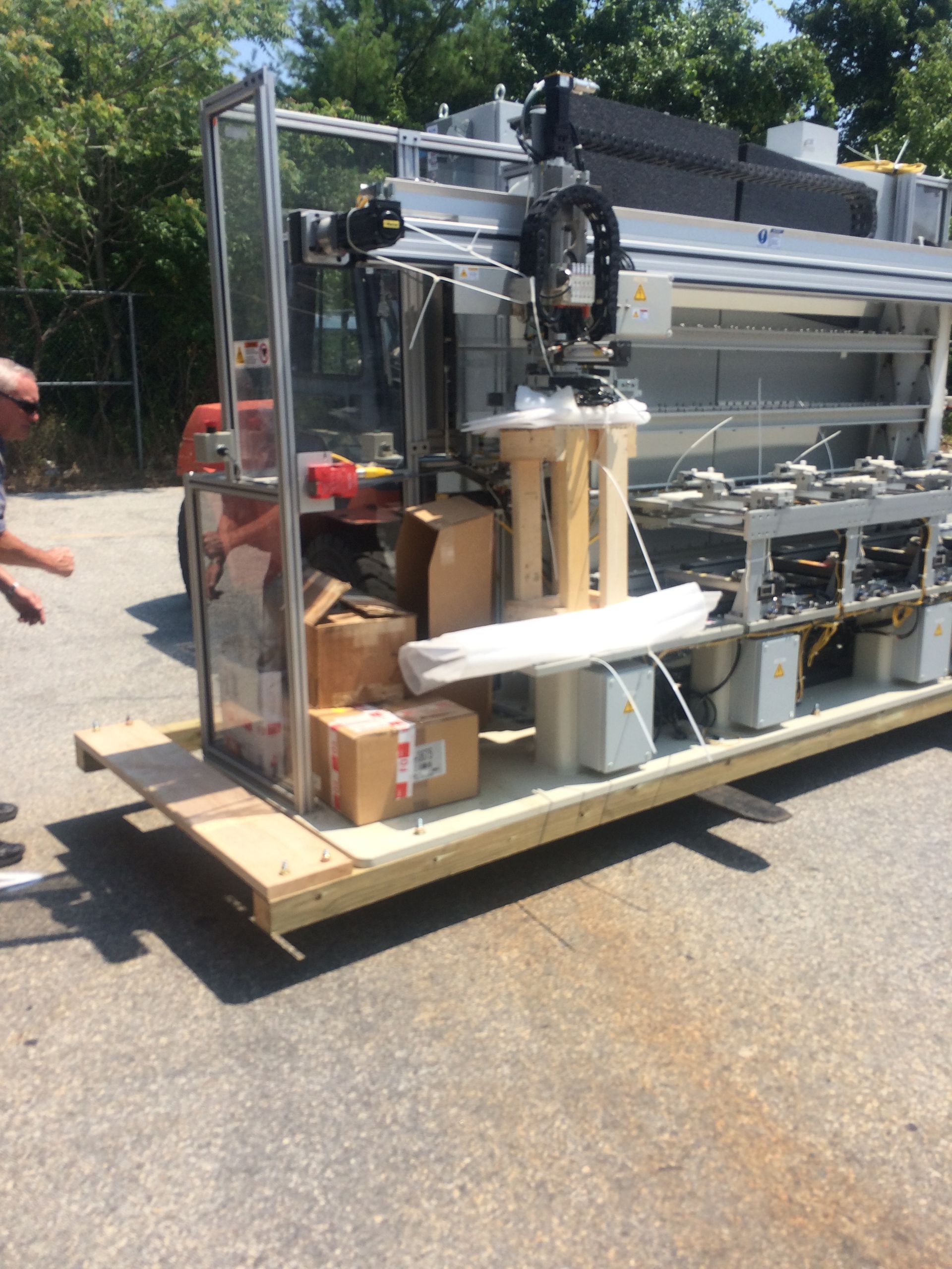 A large machine on a wooden pallet
