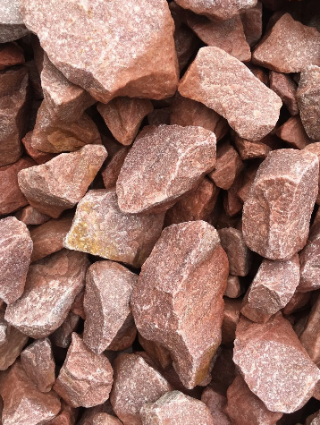 Red crushed stone. Rough, angular texture.