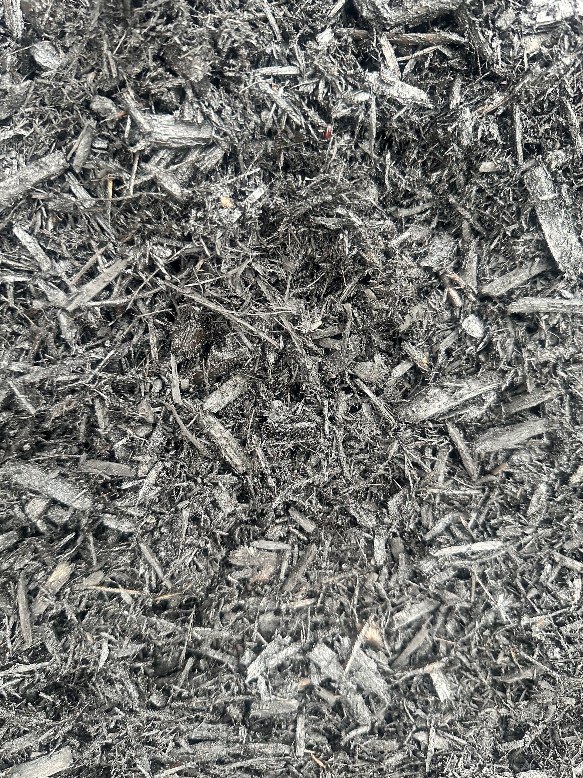 Gray and white wood chip mulch.