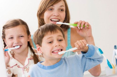 happy Family brushing her tooth