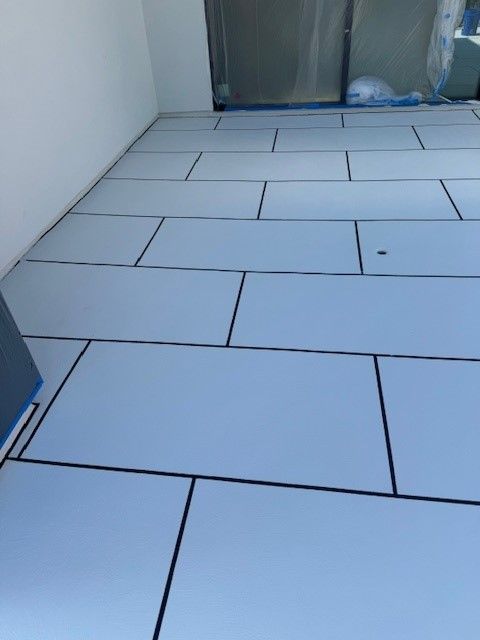 Outdoor terrace with white tiles.