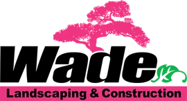 Logo for Wade Landscaping & Construction, featuring black text and a pink tree graphic.