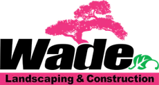 Logo for Wade Landscaping & Construction, featuring black text and a pink tree graphic.