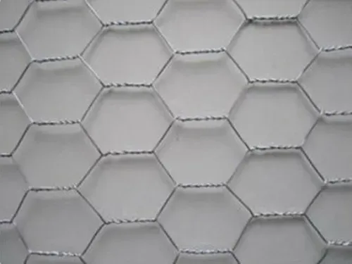 Gray hexagonal tile pattern with subtle raised edges and grout lines
