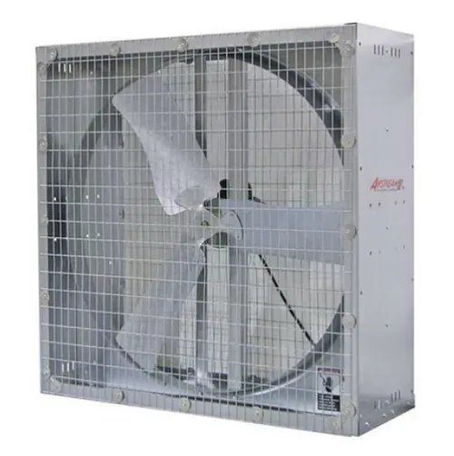 Large industrial wall fan with metal cage and white blades on a gray background