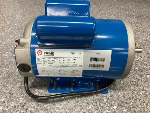 Blue electric motor with a label, mounted on a base and shown on a gray carpeted surface
