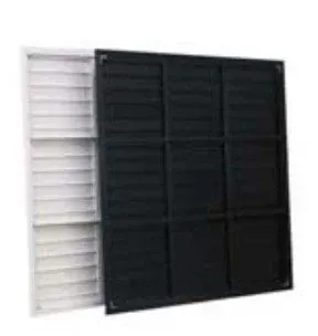 Black and white louvered window shutters, one pair overlapping another.