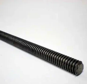 Black threaded metal rod or screw lying diagonally on a white background