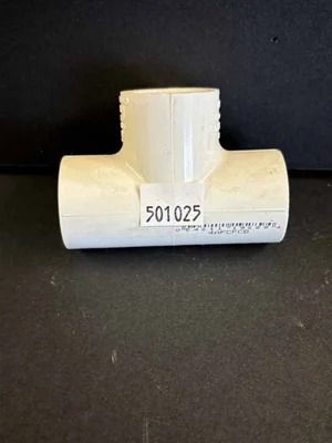White PVC T-fitting with a label number 501025 on a black background