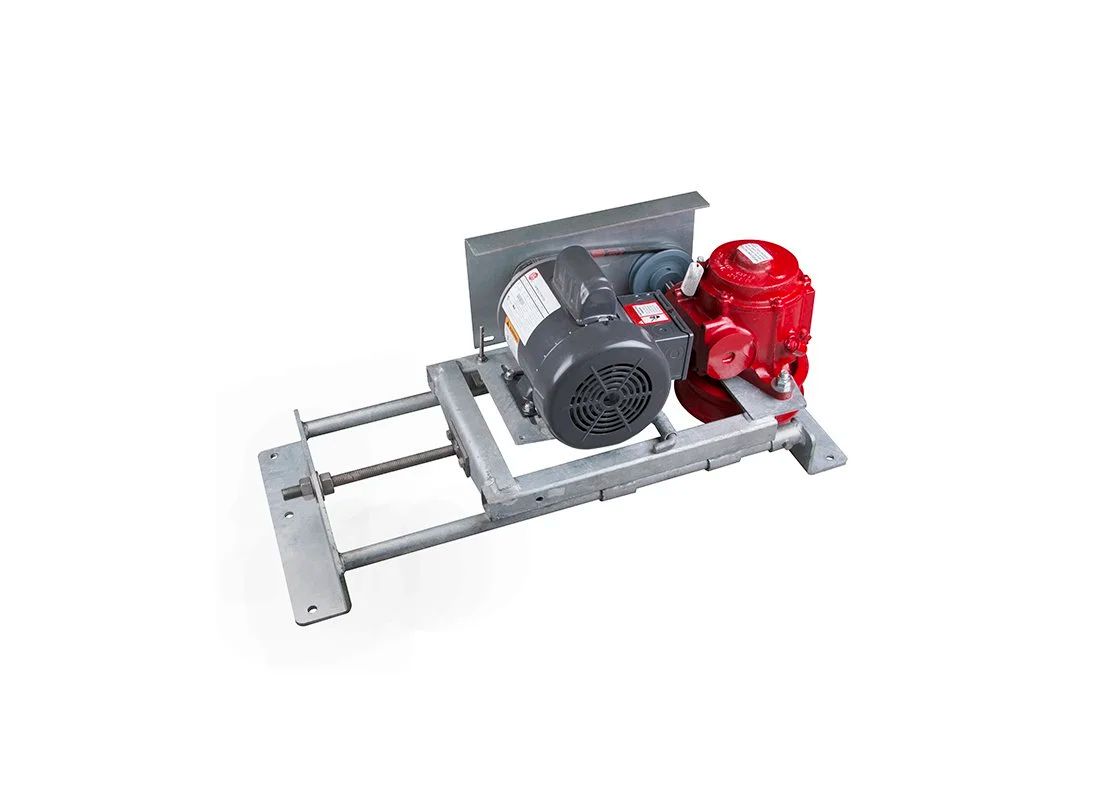 Industrial machine on a metal frame, with a red engine and black wheel assembly.