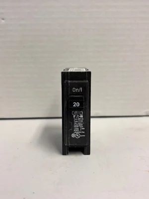 Black Canon 20 film cartridge standing upright against a plain white background