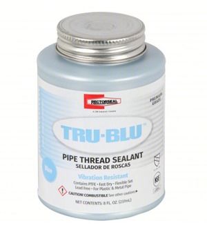 Blue Tru-Blu pipe thread sealant jar with silver lid on a white background
