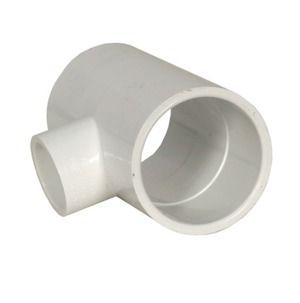 White PVC pipe T-joint with one large opening and a smaller side outlet on a plain background