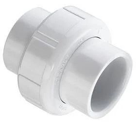 White plastic pipe coupling with a larger center body and smaller ends on a plain background