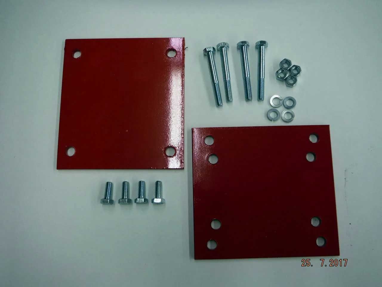 Two red metal plates, screws, bolts, washers, and nuts. Equipment for assembling something.