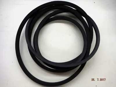 A black, circular rubber belt, likely for machinery.