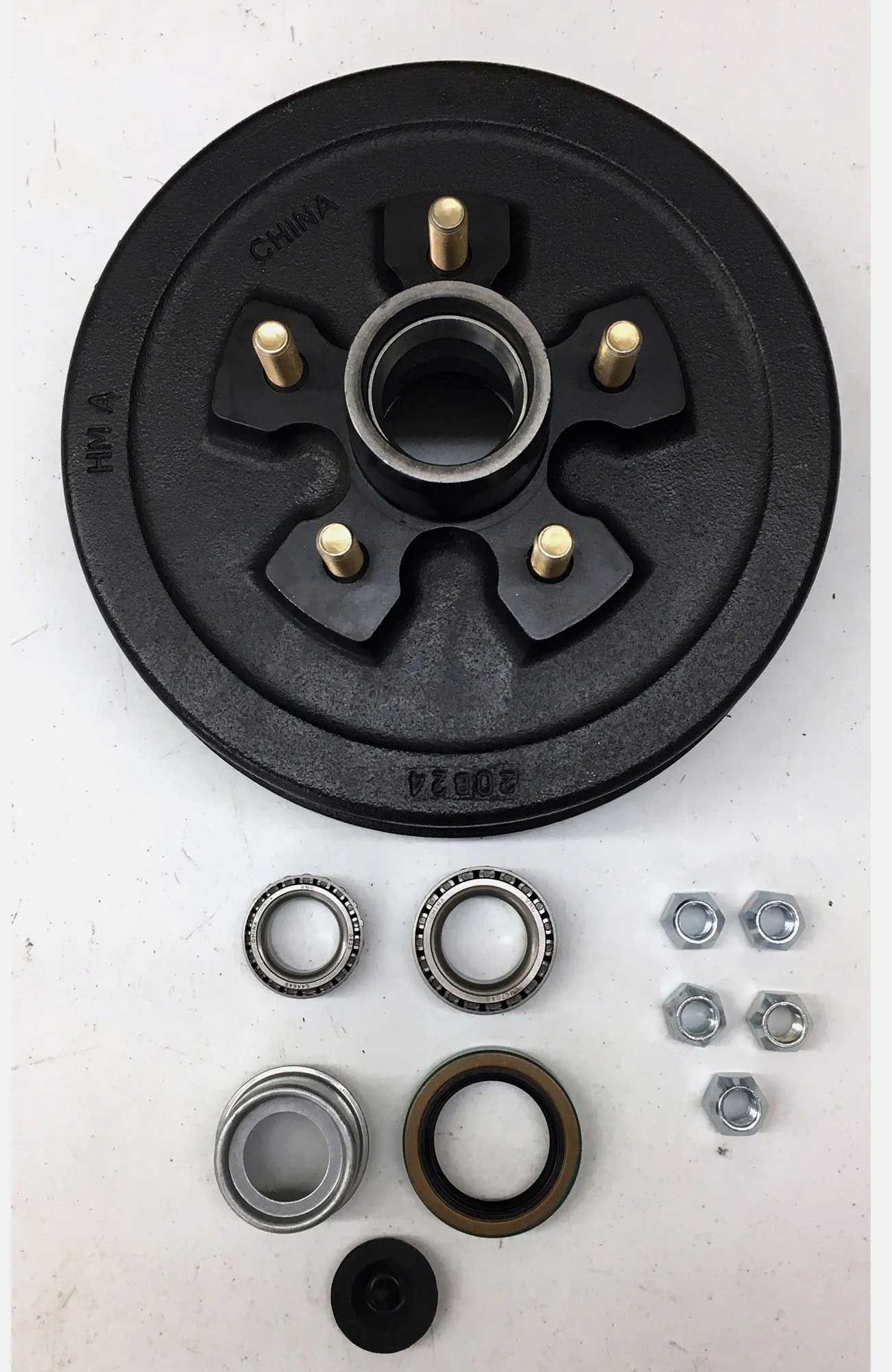 Black trailer drum brake assembly with bearings, seals, and lug nuts, likely for vehicle repair.