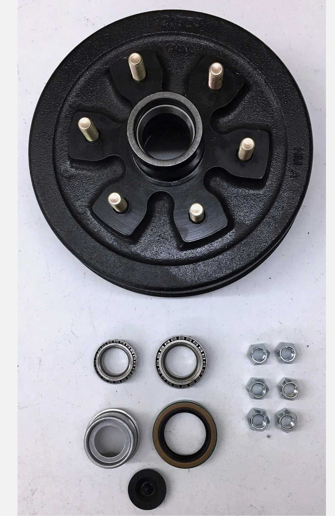 Black trailer hub assembly with bearings, seal, dust cap, and lug nuts, viewed from above.