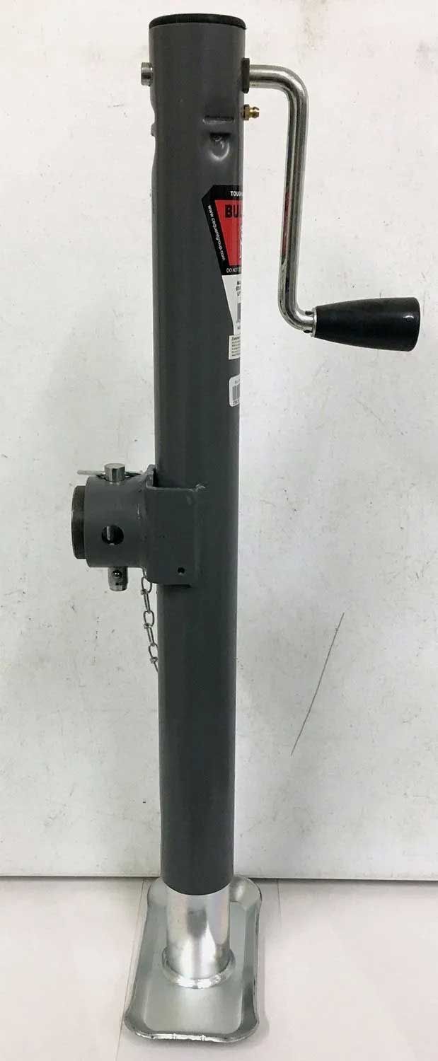 A gray trailer jack with a hand crank, used for lifting and supporting a trailer. It has a rectangular base and is against a white background.