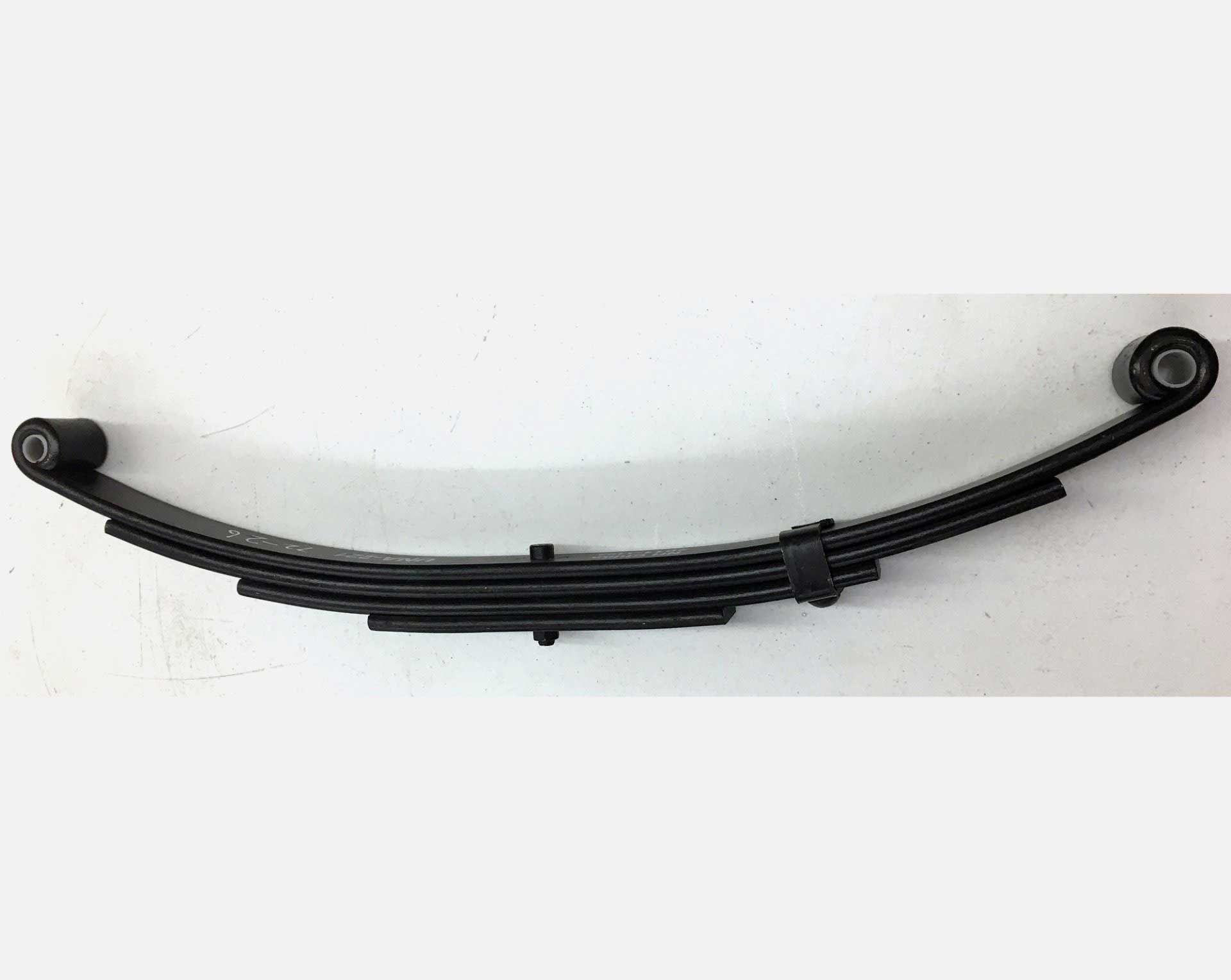 Black leaf spring, a vehicle suspension component, with multiple curved steel leaves and rubber bushings at the ends.