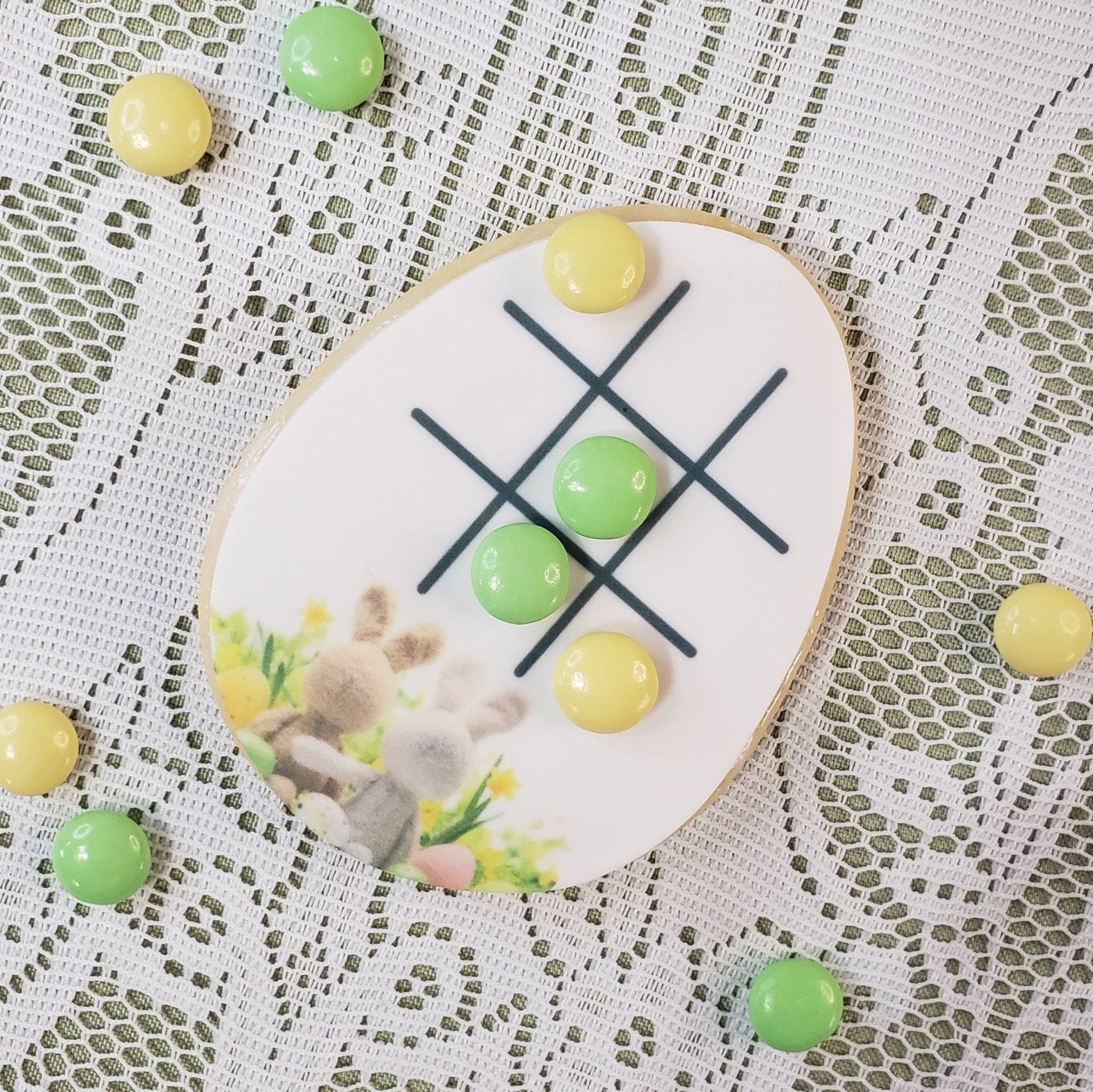 a cookie with a picture of a bunny on it